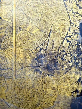 grunge Thai painting with enamel technic on the entry gate of Thai temple                         の写真素材