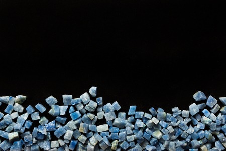 azul boquira granite, crushed granite blue on a black backgroundの写真素材