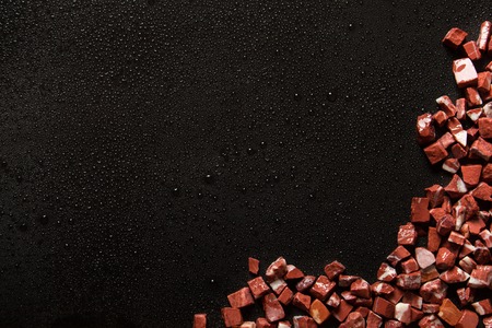 rosso levante, red marble on black background