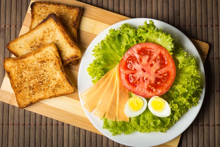 sandwich with cheese, tomato and smoked meatの写真素材