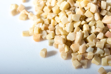 beautiful natural yellow stone scattered on a whiteの写真素材