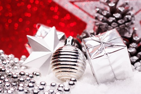 Christmas composition of Christmas tree toys on a red background.の写真素材