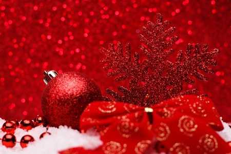 Christmas composition of Christmas tree toys on a red background.の写真素材