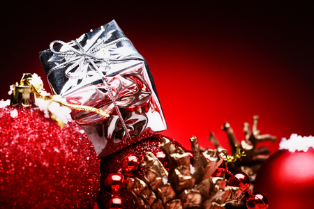 Christmas composition of Christmas tree toys on a red background.の写真素材