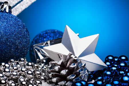 Christmas composition of Christmas tree toys on a blue background.の写真素材