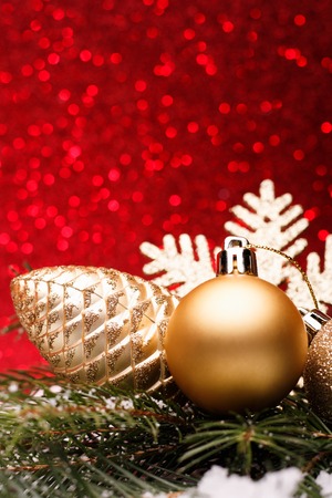 Christmas composition of Christmas tree toys on a red background.の写真素材