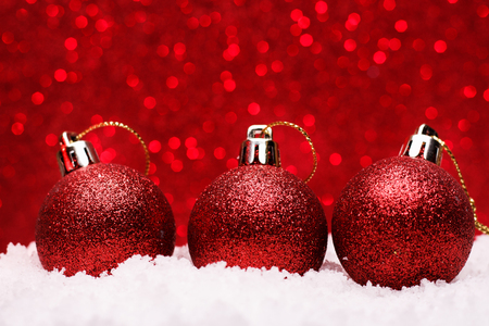 Christmas composition of Christmas tree toys on a red background.の写真素材