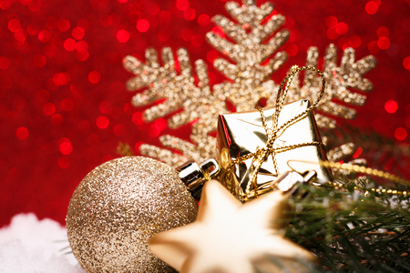 Christmas composition of Christmas tree toys on a red background.の写真素材