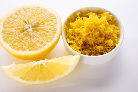 Lemon and juice on a white background.の写真素材