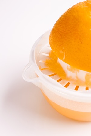oranges and juice on a white background.の写真素材