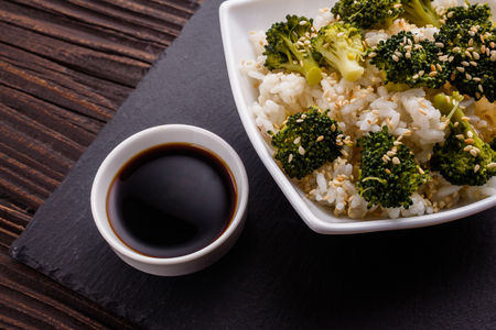 cauliflower and broccoli on a rustic background.の写真素材