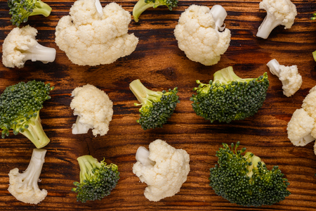cauliflower and broccoli on a rustic background.の写真素材