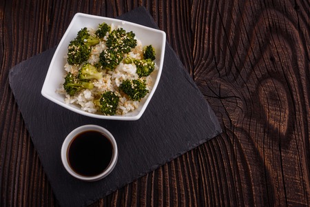 cauliflower and broccoli on a rustic background.の写真素材