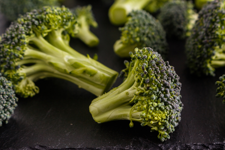 fresh green broccoli on a rustic background.の写真素材