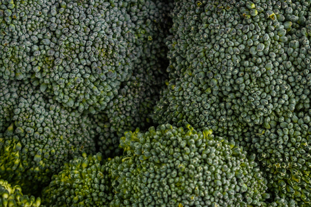 fresh green broccoli on a rustic background.