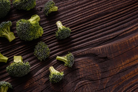fresh green broccoli on a rustic background.の写真素材