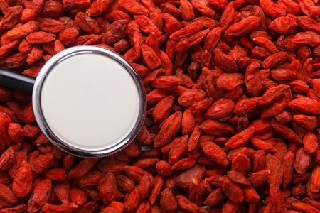 dried goji berries on a wooden rustic background.の写真素材