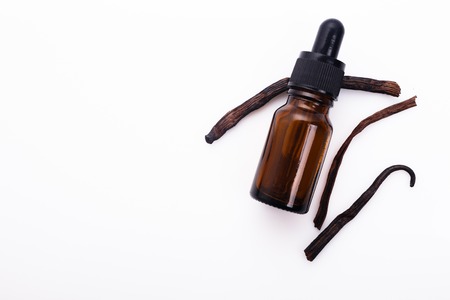 vanilla essential oil on a white background.の写真素材