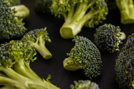 fresh green broccoli on a rustic background.の写真素材