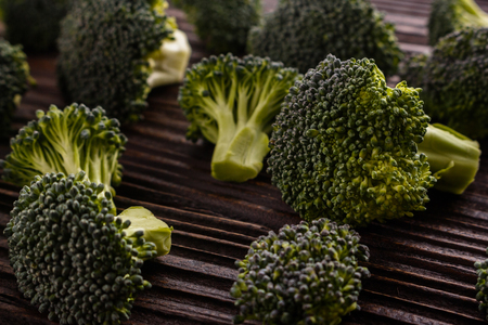 fresh green broccoli on a rustic background.の写真素材