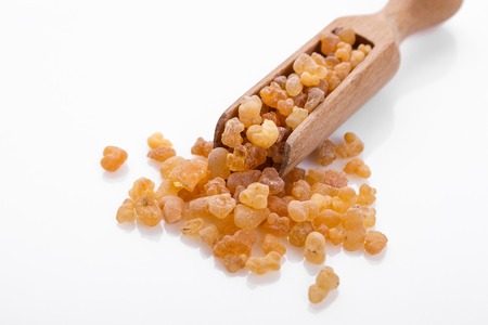 fragrant frankincense on a white acrylic background.の写真素材