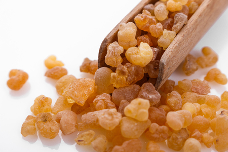 fragrant frankincense on a white acrylic background.の写真素材