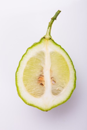 Lemon essential oil on a white background.の写真素材