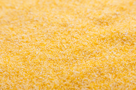 raw Italian corn porridge polenta background.の写真素材