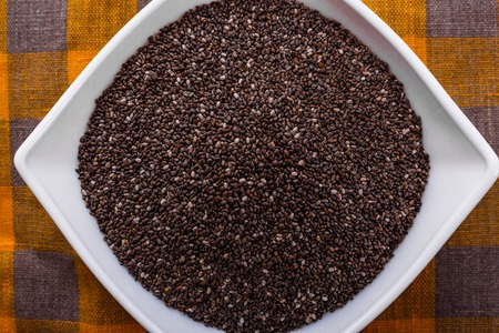 chia seeds on a light rustic background.
