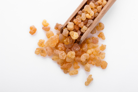 fragrant frankincense on a white acrylic background.の写真素材