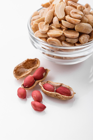 fresh peanuts on a white acrylic background.の写真素材