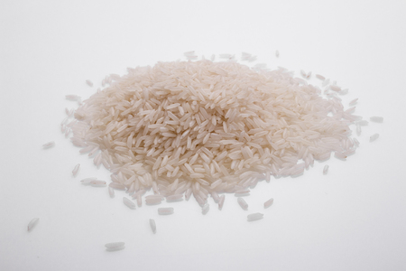 Jasmine rice on a white acrylic background.の写真素材