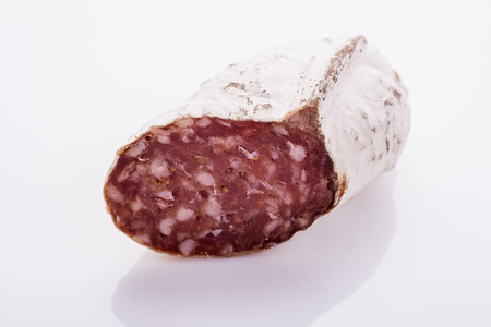 Saucisson sec delicious french salami on a white background.の写真素材