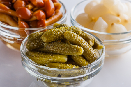pickled vegetables on a white acrylic background.の写真素材