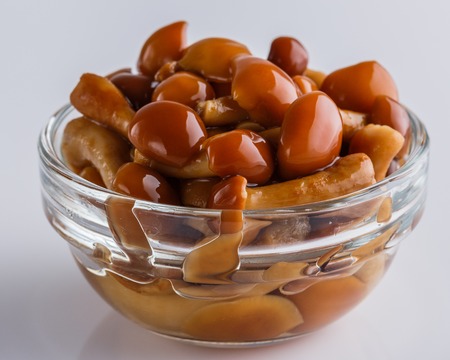 pickled vegetables on a white acrylic background.の写真素材