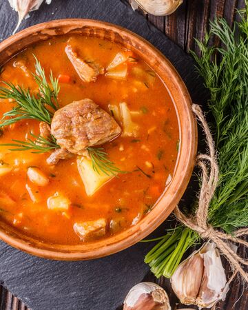 Chanahi a traditional Georgian meat stew in a bowl on stoyn board.の写真素材