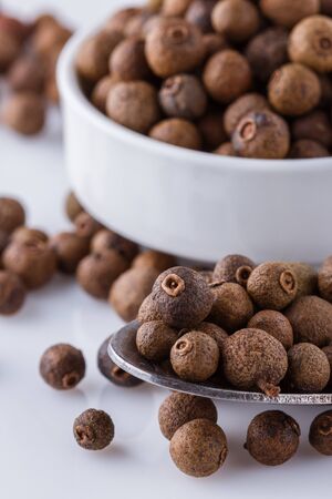 fresh spicy peppers on white acrylic backgroundの写真素材