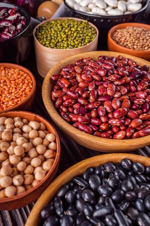 Fresh organic natural beans on wooden rustic background.の写真素材