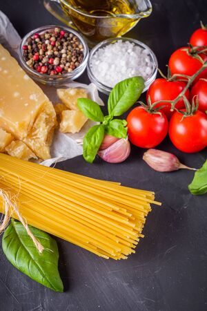 concept of traditional italian pasta with tomatoes and basil.の写真素材