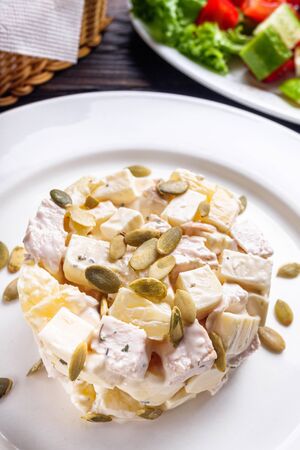 Hawaiian salad on dark wooden rustic background.の写真素材