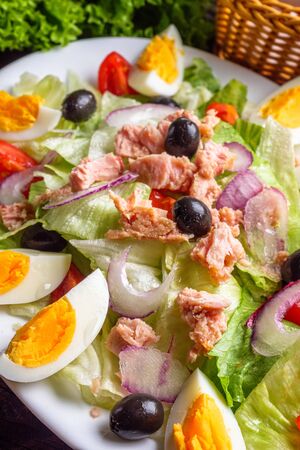tuna salad on dark wooden rustic background.の写真素材