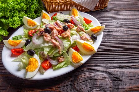 tuna salad on dark wooden rustic background.の写真素材