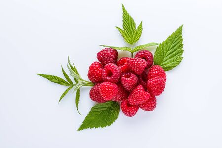 Juicy fresh natural raspberries on white acrylic background.の写真素材