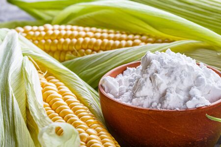 corn starch on a dark stone background.の写真素材