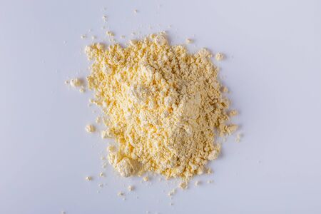 natural corn flour on white acrylic background.の写真素材