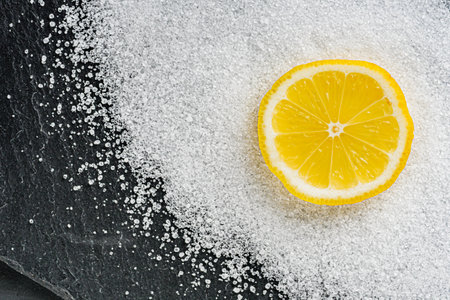 citric acid on a dark stone background.の写真素材