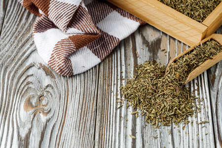 fragrant dried thyme on a wooden rustic background.の写真素材