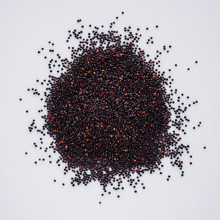 black quinoa seeds on a white acrylic background.の写真素材