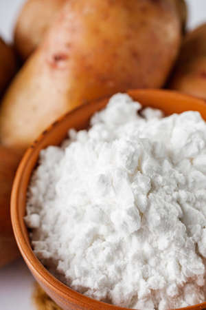 potato starch on a white acrylic background.の写真素材