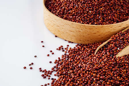 red quinoa seeds on a white acrylic background.の写真素材
